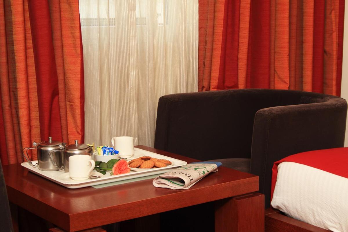 ปาริจาธา เกทเวย์ โฮเต็ล Hotel บังกาลอร์ ภายนอก รูปภาพ